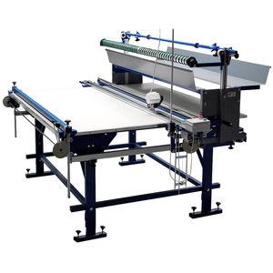 manual spreading machine / for textiles