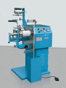 tape winder / fabric / for weaving machine