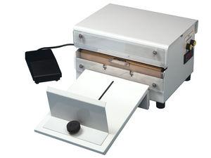 automatic heat sealer / foot-operated / for bag closing / ferromagnetic