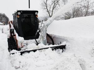 compact loader snow blower