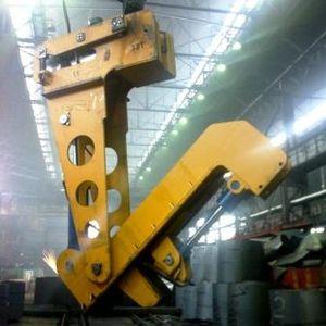 hydraulic metal lifting and turning device / for coils