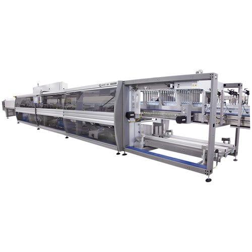 automatic shrink wrapping machine / continuous-motion / with heat shrink film / with shrink tunnel