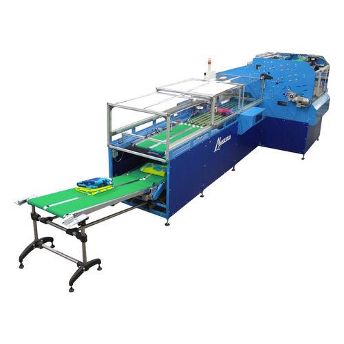 fabric folding machine / X-fold