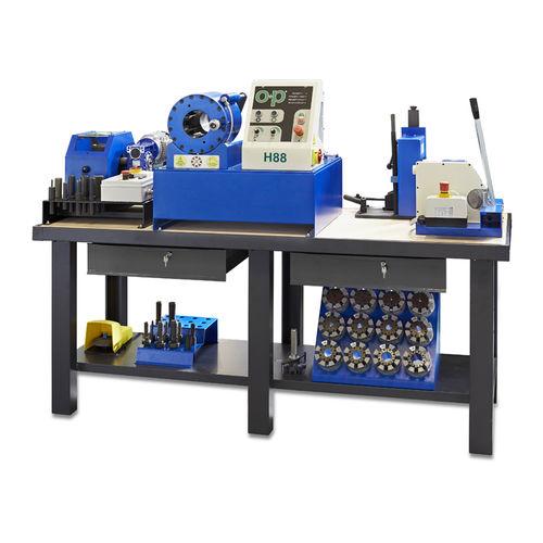 steel workbench / with crimping machine / with tool holder panel / with compartments