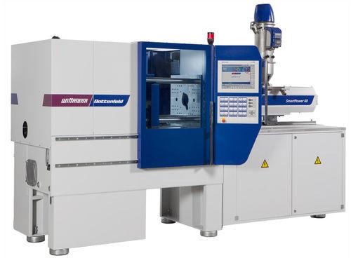 horizontal injection molding machine / servo-hydraulic / three-platen / modular