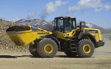 wheel loader / articulated / large / for construction