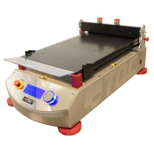 vacuum film applicator / automatic