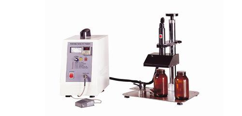 semi-automatic heat sealer / ferromagnetic / cap / for plastic bottles