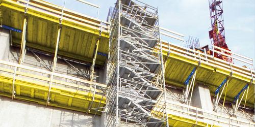 fixed scaffolding tower / with stairway / facade