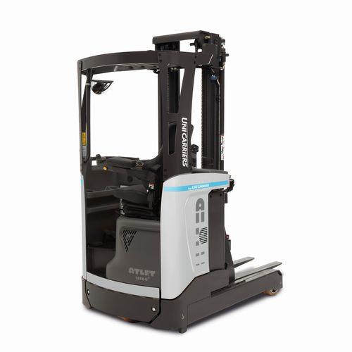 electric reach truck / side-facing seated position / for warehouses / compact