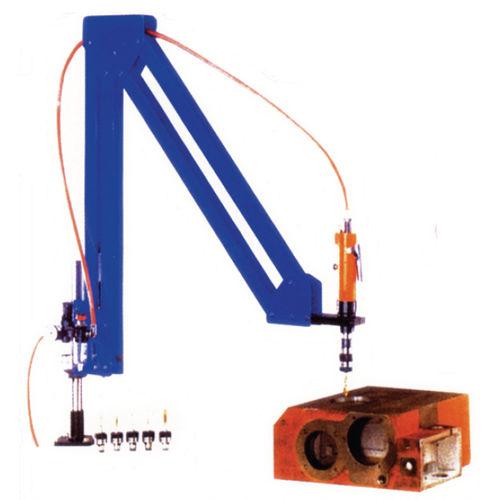 pneumatically-operated tapping unit