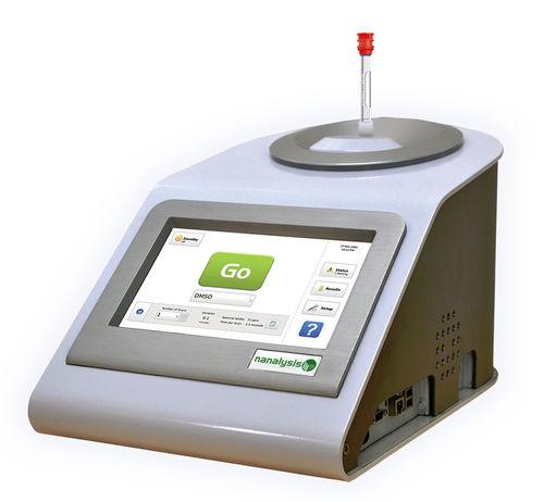 NMR spectrometer / desk / laboratory