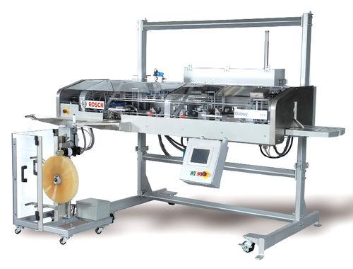 bag closing machine / folding / adhesive tape