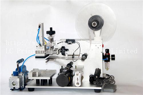 side labeler / horizontal / for flat products / for pharmaceutical industry