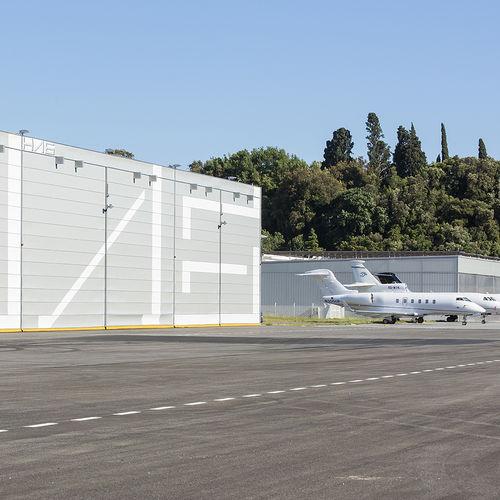 folding doors / for civil and military aviation / hangar / fabric