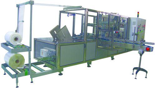 automatic shrink wrapping machine / with traveling sealing bar